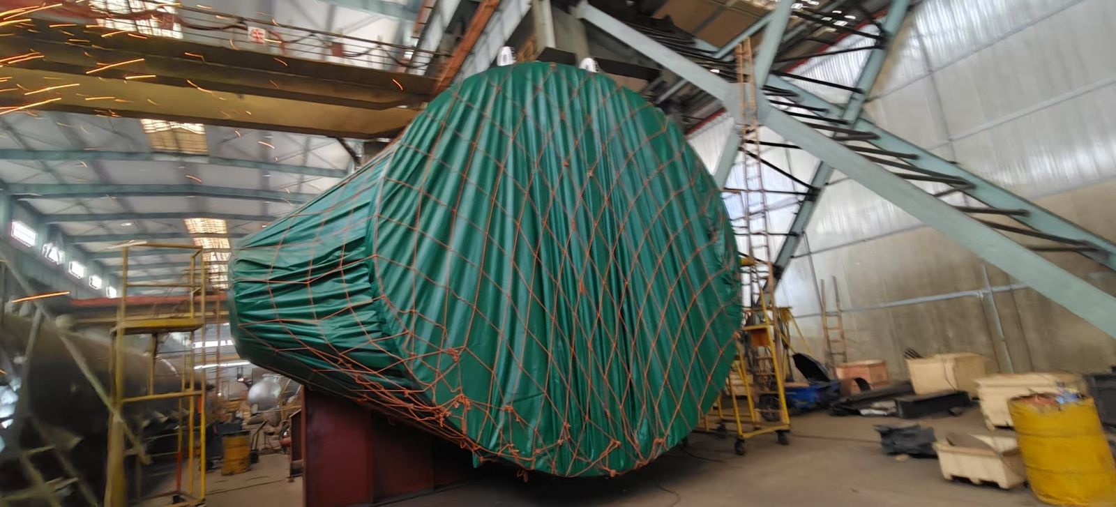 Column wrapped and netted for transport